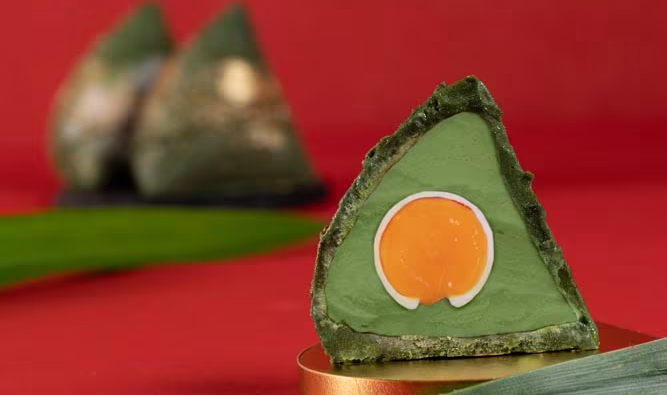 Pandan Coco Rice Dumpling Ice Cream: Ice cream wrapped in aromatic pandan leaves, inspired by traditional Nyonya dumplings!
