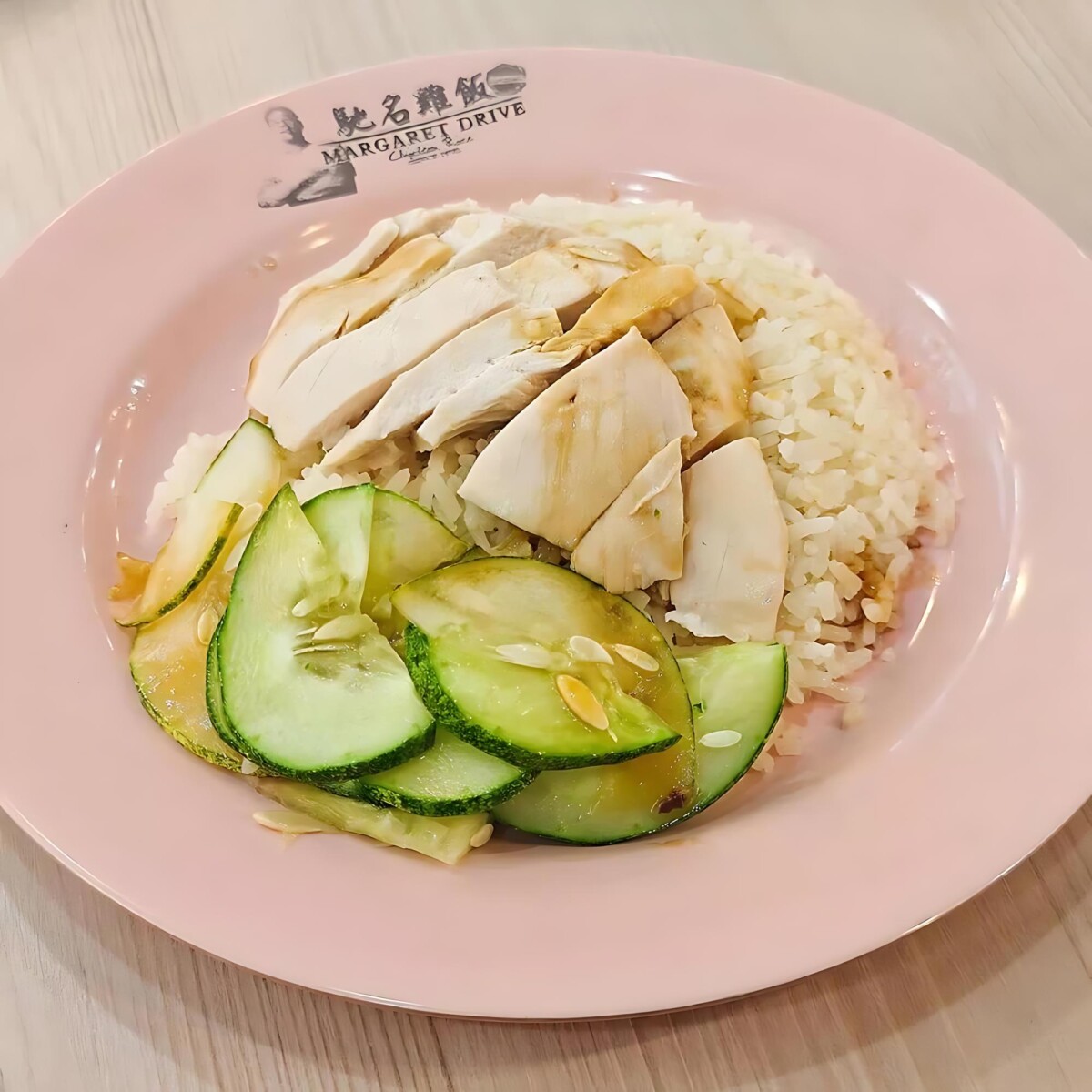 Savor Singapore's national treasure: perfect chicken rice at Sin Kee.