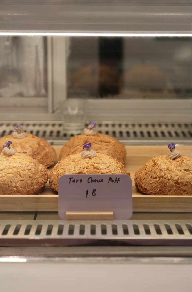 Indulge in an unexpected twist on taro with Cafe Lilac's unique choux pastries filled with creamy Orh Nee!