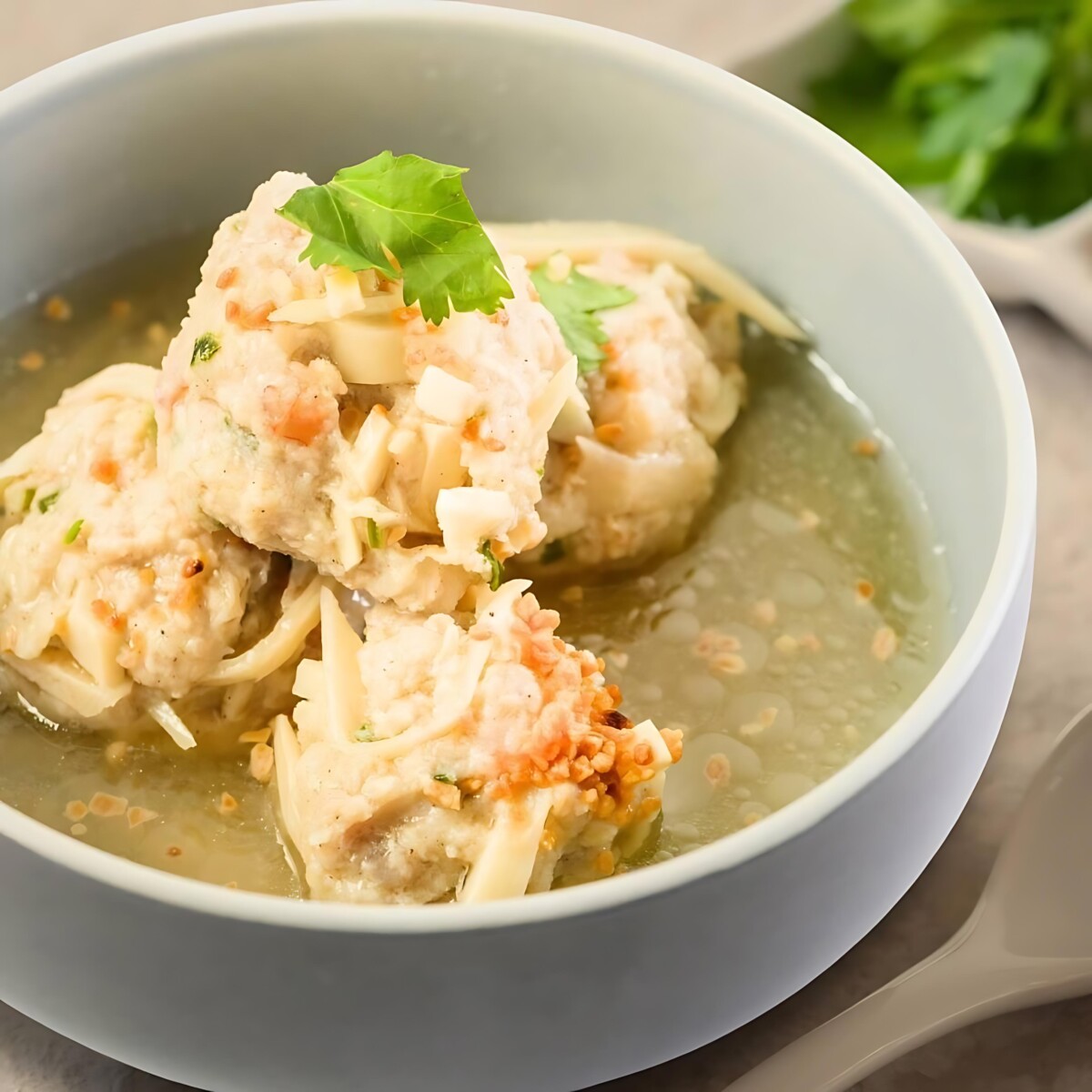 Godmama's Bakwan Kepiting: Juicy crab, pork &amp; prawn meatballs in a comforting broth - pure decadence!