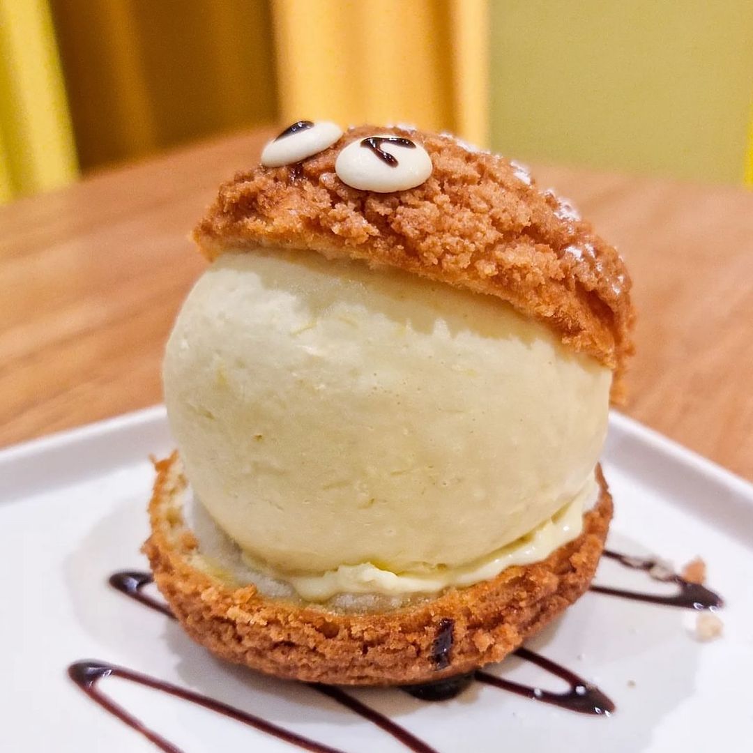 Pang Zi's signature creation features Mao Shan Wang durian nestled in a craquelin puff with hidden mochi!