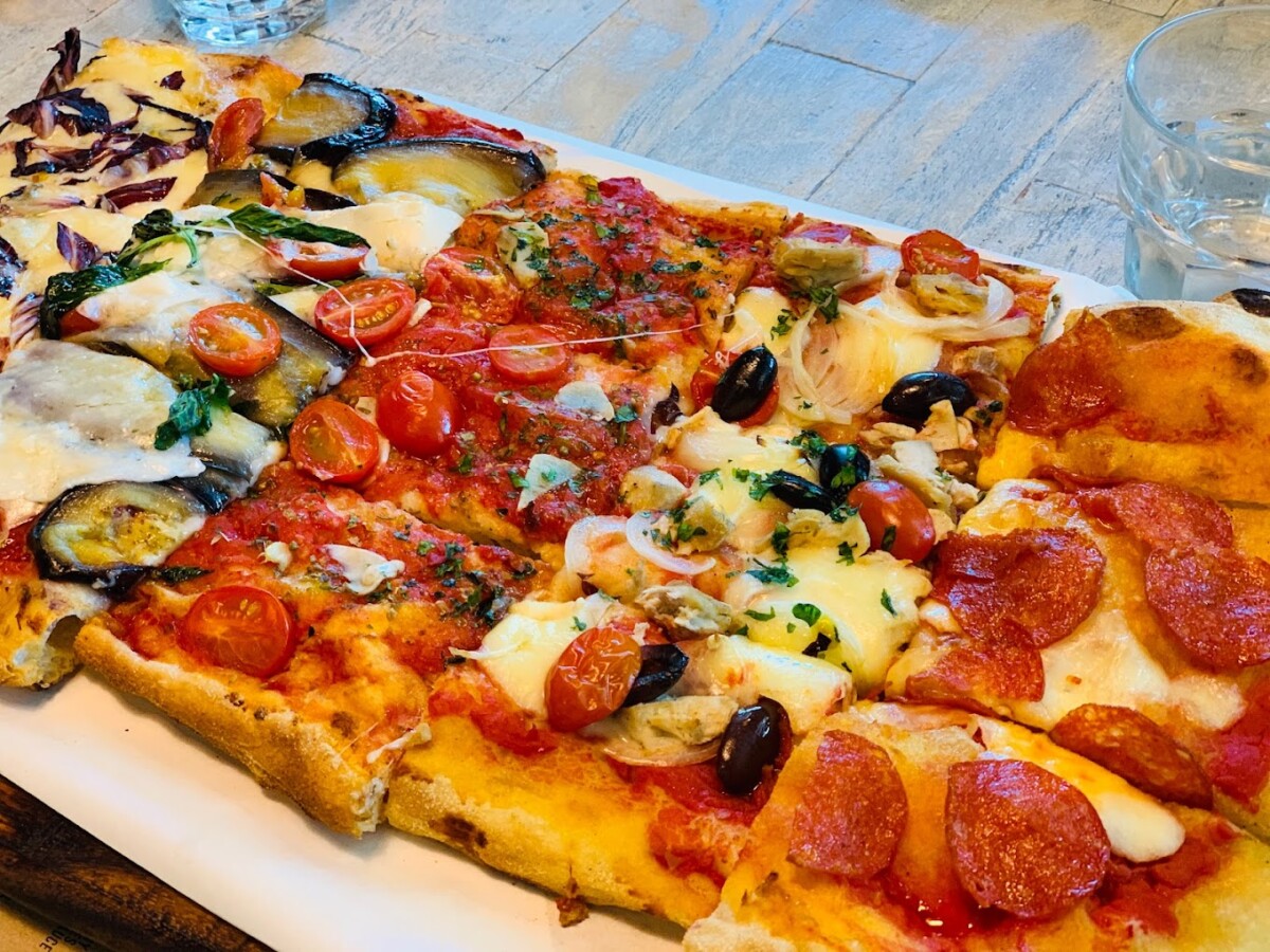 Cosy Italian comfort with iO Italian Osteria pizza.