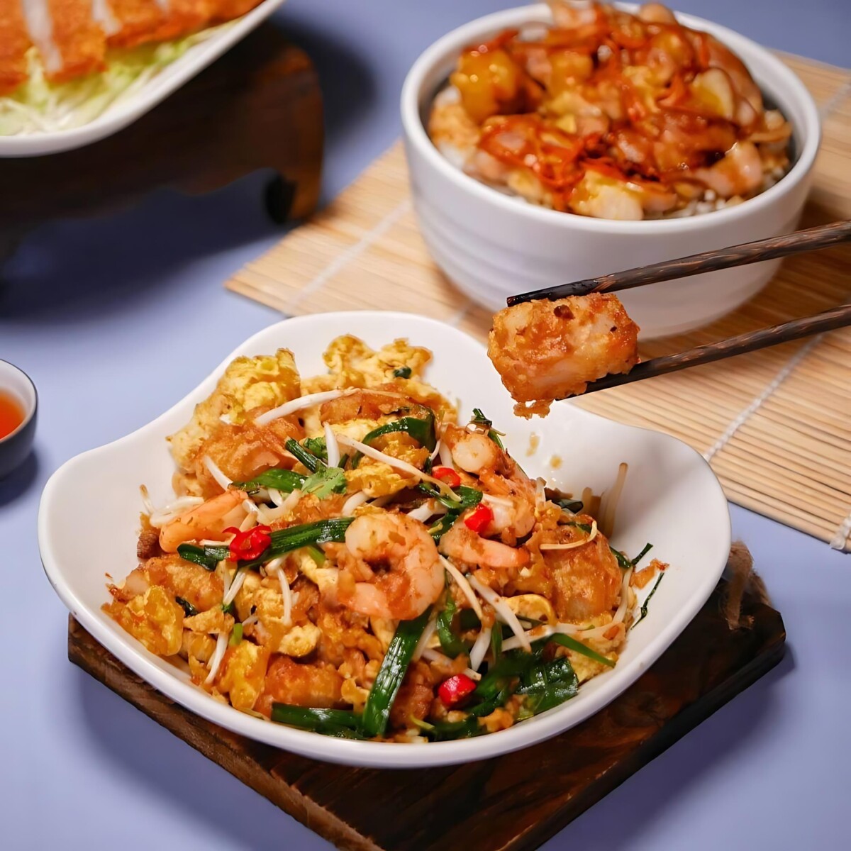 Delight in the crispy exterior and savoury wok hei flavour of their pan-fried radish cake.