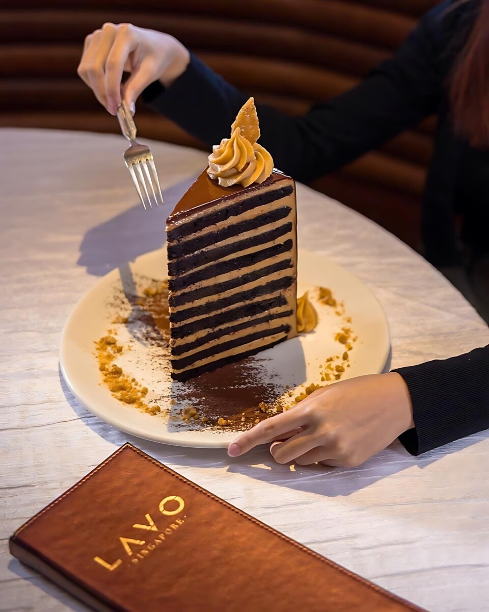 Indulge in pure decadence with LAVO's signature 20-layer chocolate cake.