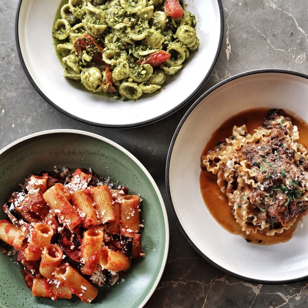 Savour the taste of pasta in a vibrant setting.