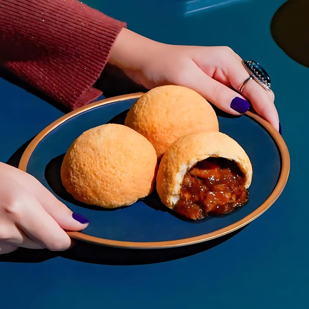Irresistible crispy baked buns filled with juicy BBQ pork.