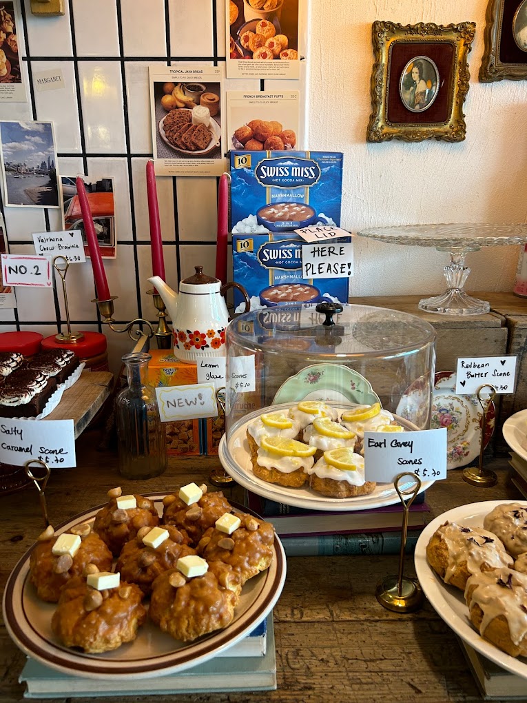 A charming Korean-inspired cottage-core aesthetic cafe with vintage decor.