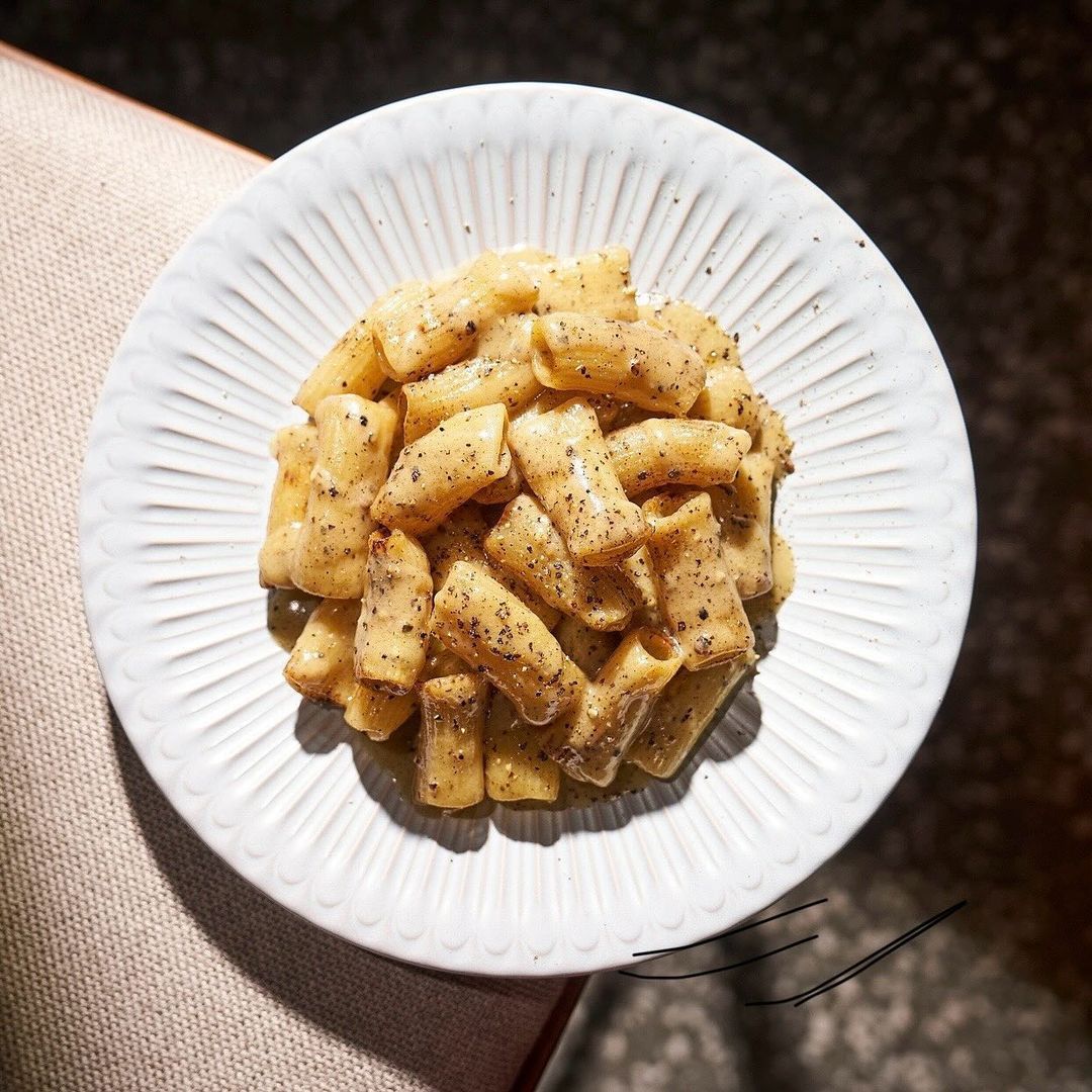 A classic Italian delight, perfectly executed with rich, creamy sauce and black pepper.