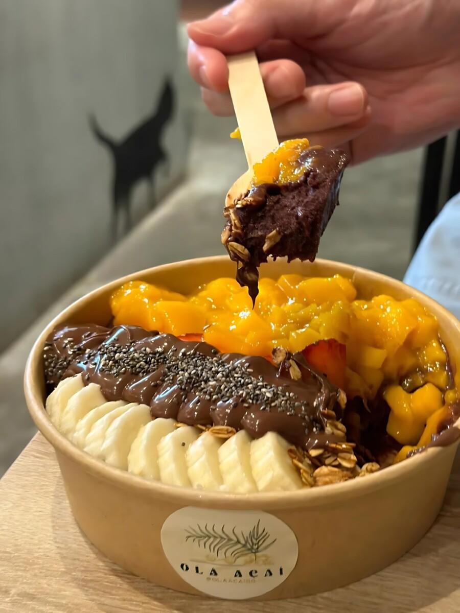  Taste the tropics with Ola Acai's Island Gal bowl, a burst of fruity flavors perfect for a sunny day.